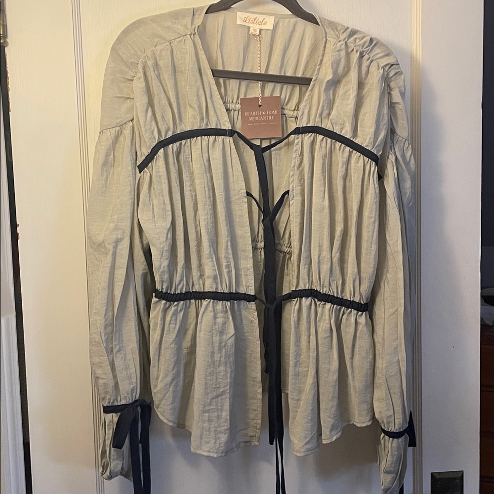 Flouncy Blouse that gives this Boho meets Bridgerton. Light sage w/ navy ties